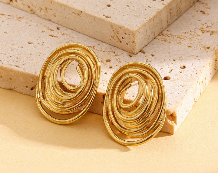 layered spiral oval earrings with matte gold finish – Nosli
