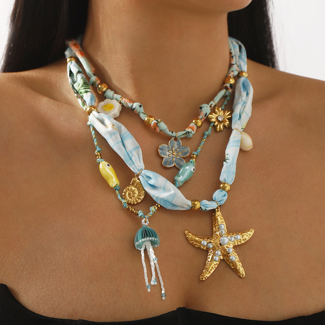 قلادة ساحرة مع لمسات من الحرير والخرز – كوراليب