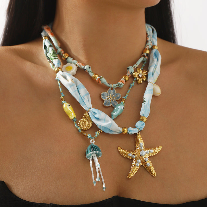 قلادة ساحرة مع لمسات من الحرير والخرز – كوراليب