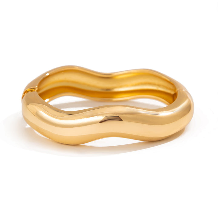 Asymmetric sculptural bangle with wave design - Enjur