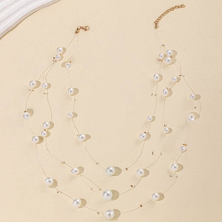 floating pearl strand necklace with layered illusion threads – AUIRO
