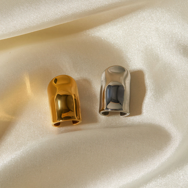 أقراط منحوتة غير متماثلة بلمسة نهائية عاكسة - زلامدي