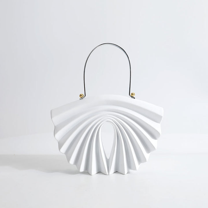 culpted accordion shell bag with metal top handle – LUCIDA
