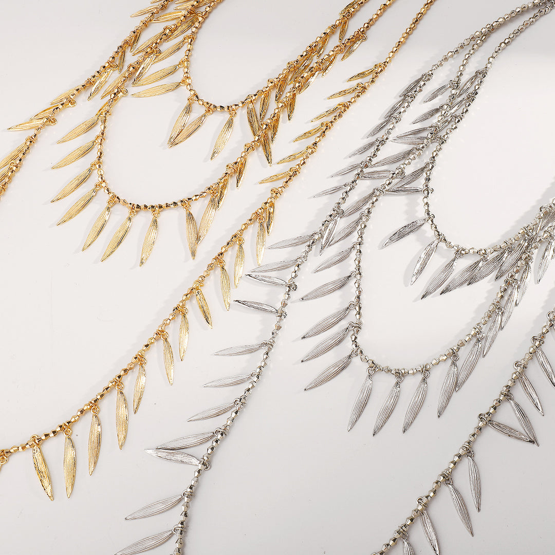 layered leaf pendant necklace with metallic finish – SERENAT