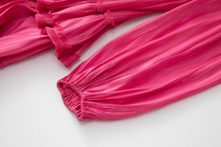 long-sleeve tiered pleated dress with voluminous hem - LÉONIE