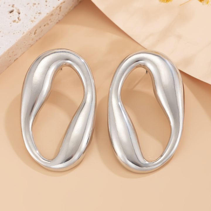Organic oval earrings with sculpted curves – Zandi