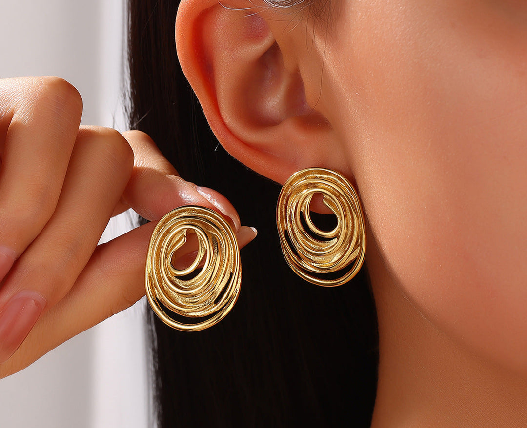 layered spiral oval earrings with matte gold finish – Nosli