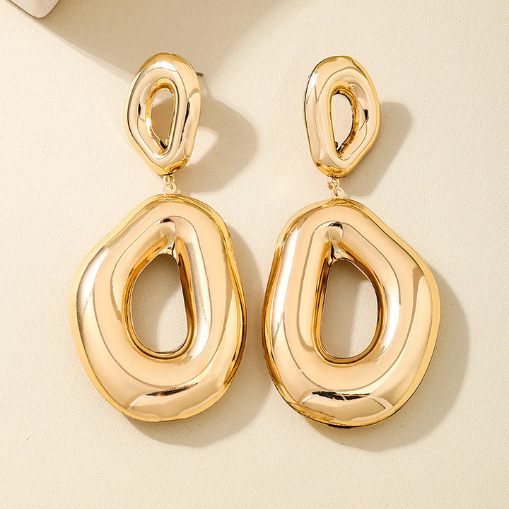 Bold molten drop earring with open center – Zindu