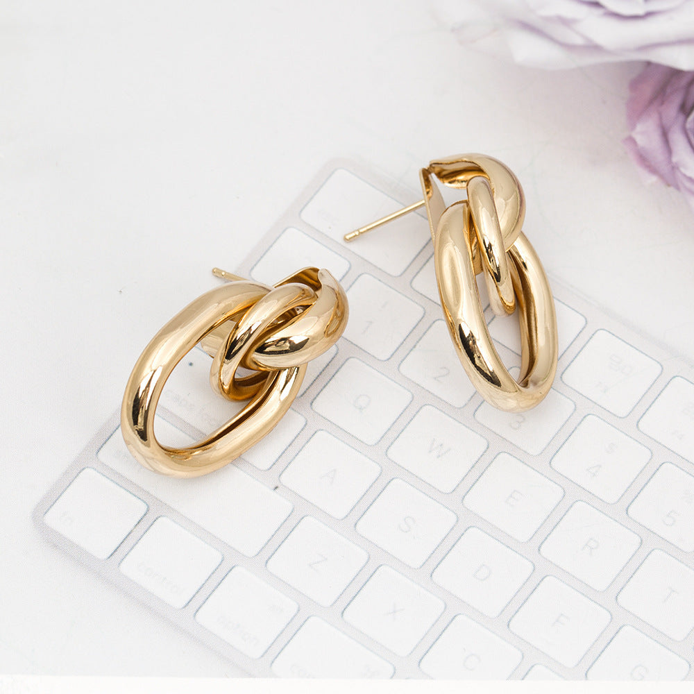 Elongated oval link earrings with polished gold finish - Argiltu