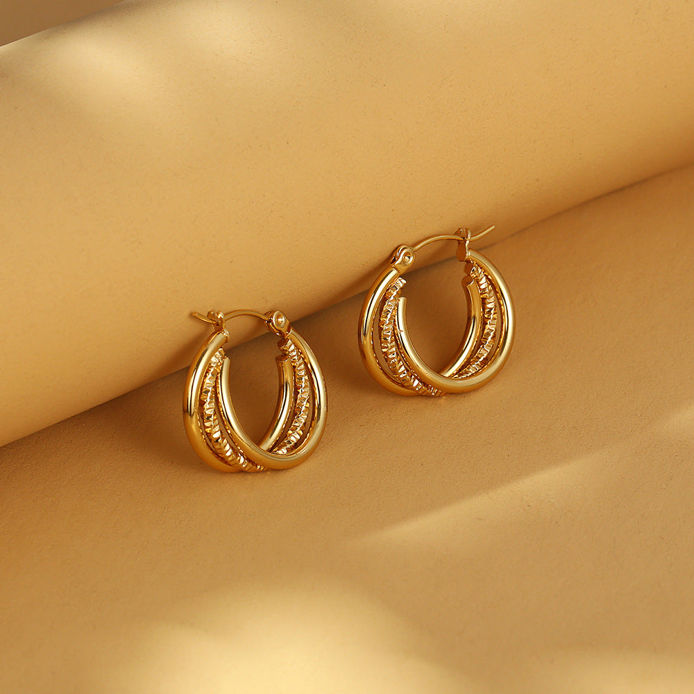 Dual-layer textured hoop earrings with engraved detail – Akoma