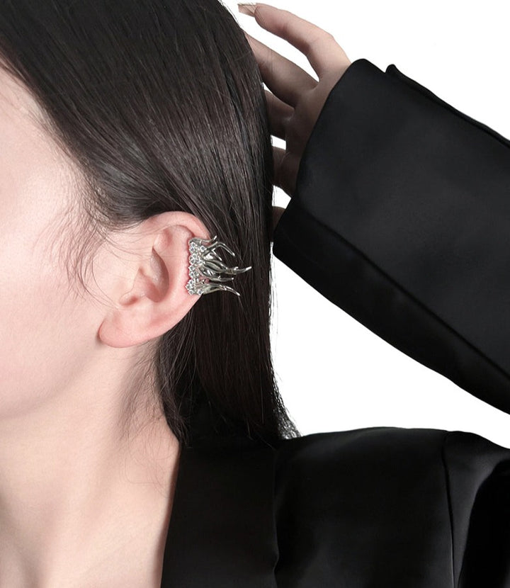 flame-shaped silver earrings with crystal accents –Eimvcan