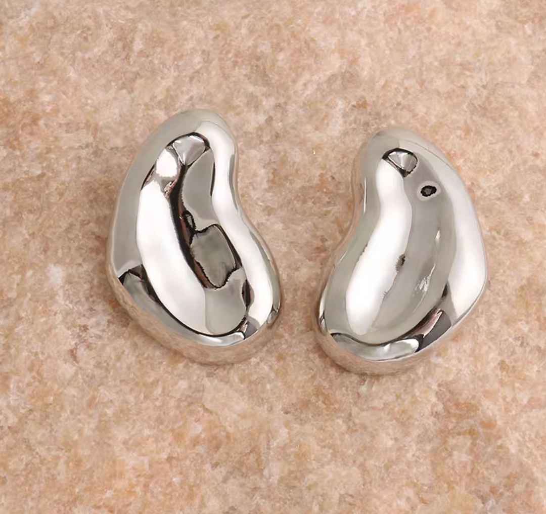 أقراط مطوية منحوتة ذات شكل تجريدي - رولمي