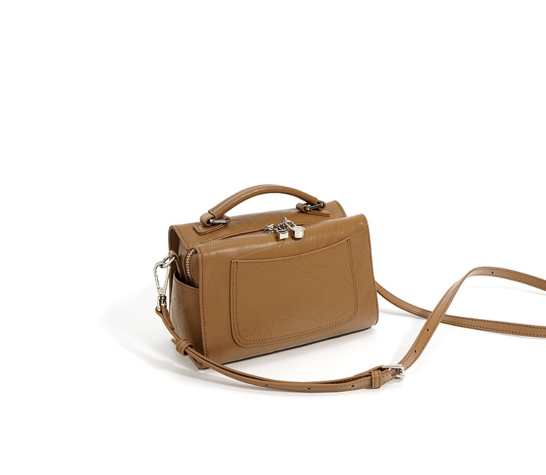 mouwloze uitlopende midi-jurk met kettingriem - CELIAV 