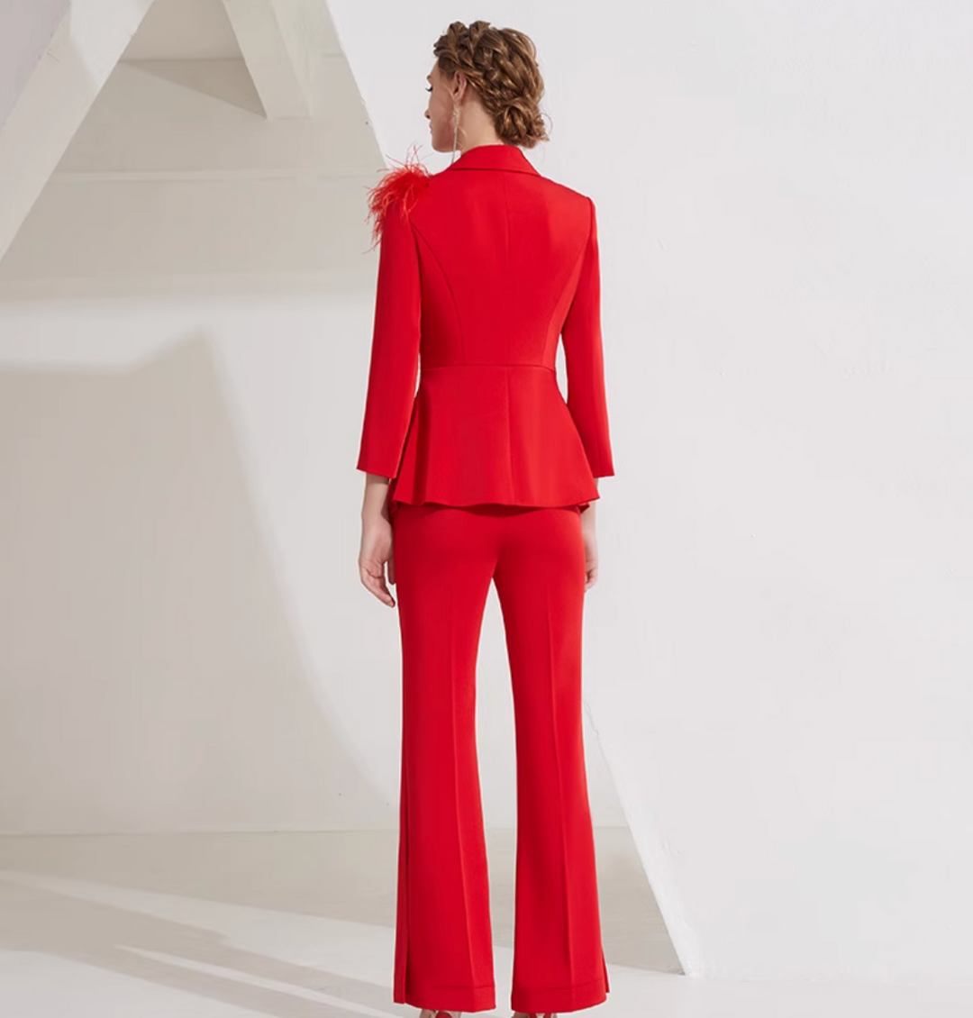 asymmetrical flare suit with feather brooch detail – CARMINE