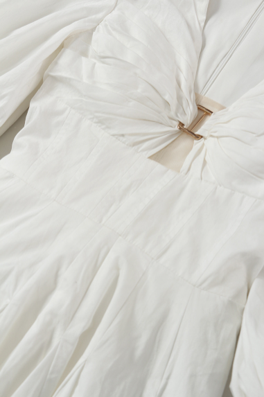 Puff-sleeve mini dress with twisted front cut-out – IVORYA