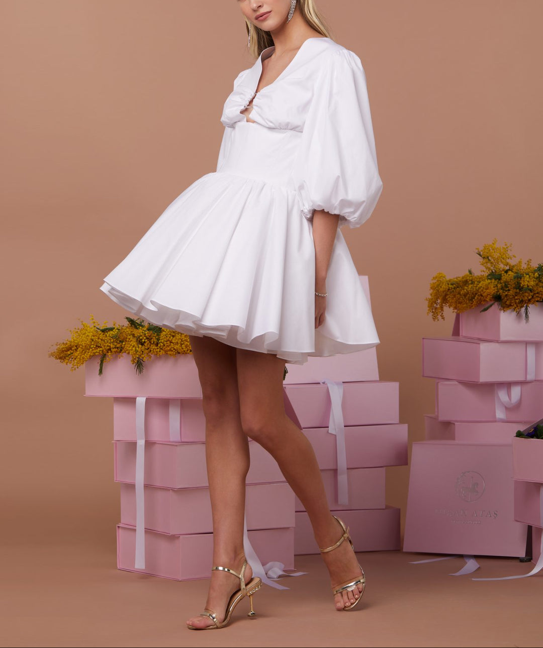 Puff-sleeve mini dress with twisted front cut-out – IVORYA