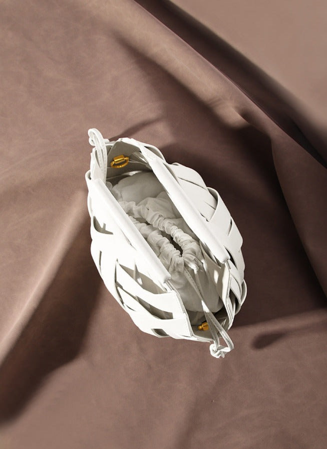 woven leather triangle-handle crossbody bag - Ahrana